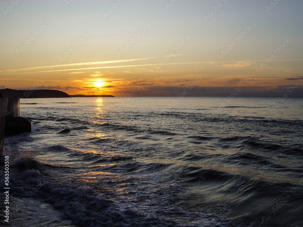 Sunset by the sea