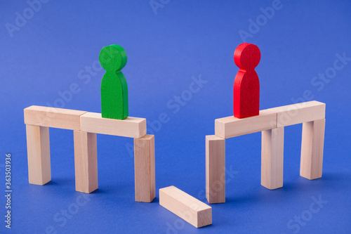Принти на полотні Two lonely wooden figures friends leaders entrepreneurs lovers standing on broke
