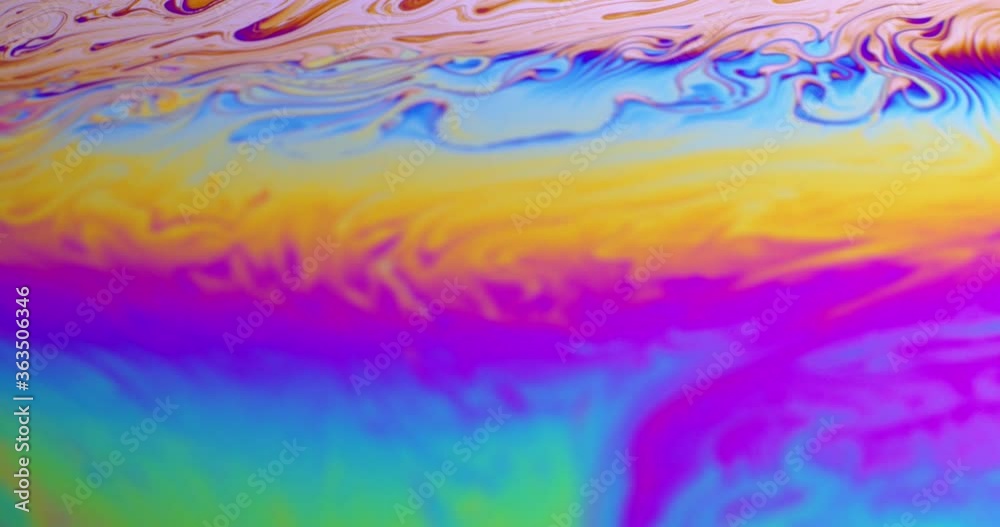 Surface of Liquid Soap with Changing Rainbow Colours. Macro. Surface of Liquid Soap with Changing Rainbow Colours. Macro.