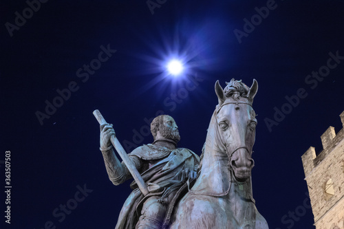 Florence, Italy, 2016.The detail of the bronze equestrian monument of Cosimo de' Medici in Signoria's square during a full moon night. photo