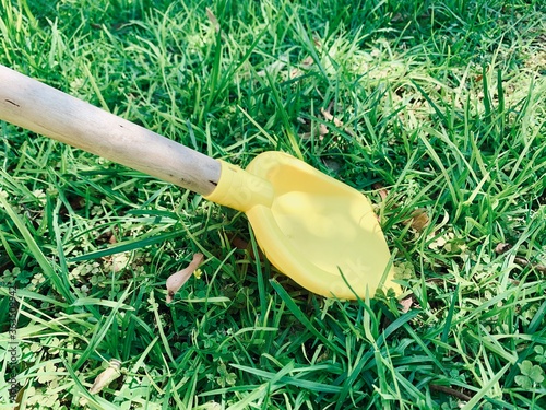 plastic Shovel in green grass