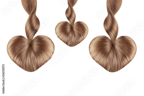 Heart made by natural brown hair on white background  isolated