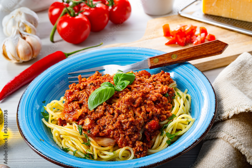 Delicious spaghetti bolognese on white background Delicious spaghetti bolognese on white background