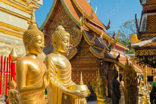 Golden Buddha Statue at Wat Phrathat Doi Suthep in Chiang Mai, Thailand. The Temple was originally built in AD 1383. photo