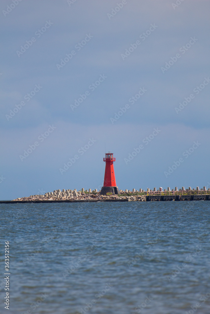 red lighthouse in the port of Gdansk in Poland