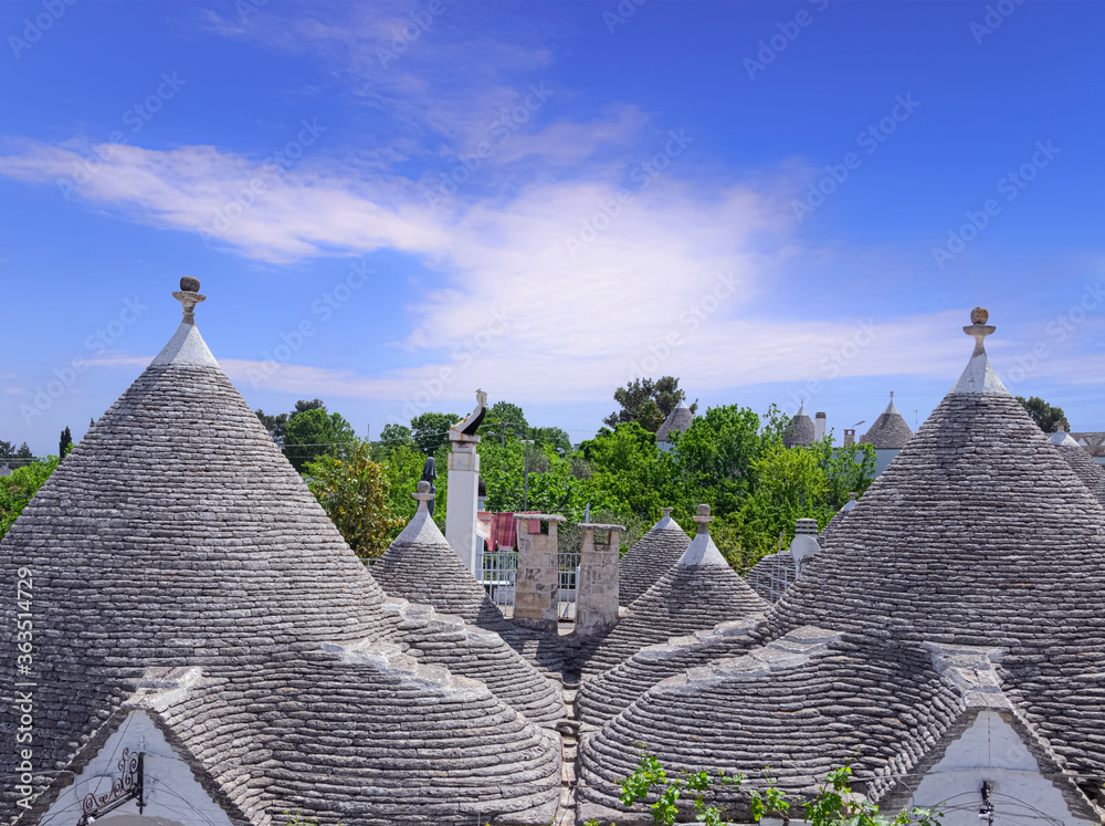 Alberobello, Italy. Typical build with dry stone walls and conical roofs are unique to the world.