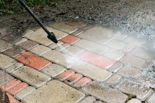 washing services - block paving cleaning with high pressure washer