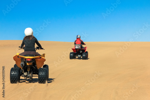 Wallpaper Mural Quad driving people - two happy bikers in sand desert dunes, Africa, Namibia, Namib, Walvis Bay, Swakopmund. Torontodigital.ca