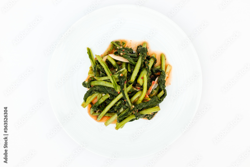 Radish kimchi on white background