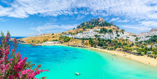 Landscape with beach and castle at Lindos village of  Rhodes, Greece photo