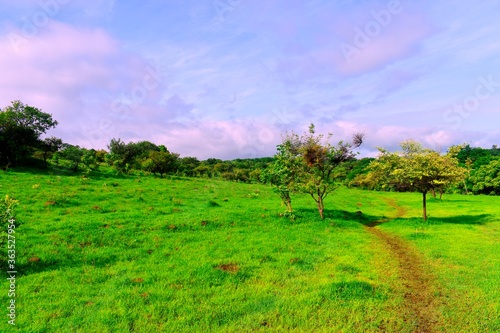 A landscape includes the physical elements of geophysically defined landforms such as (ice-capped) mountains, hills, water bodies such as rivers, lakes, ponds and the sea, living elements of land. photo