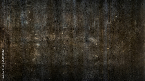 Old grungy black cement or concrete wall as background