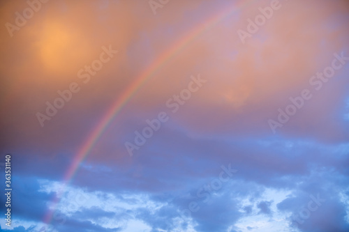 rainbow on the evening sky in the rays of the setting sun after a thunderstorm © Maria Moroz