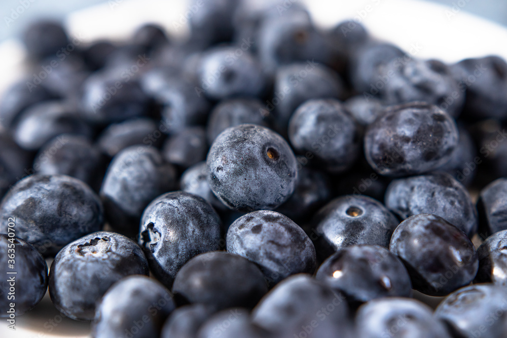 a lot of sweet fresh blueberries from the market