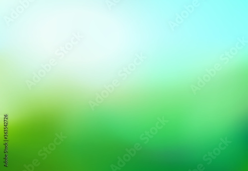 Nature gradient backdrop with sunlight rays. Abstract green blurred background. Ecology concept for your graphic design, website, banner or poster. Vector illustration