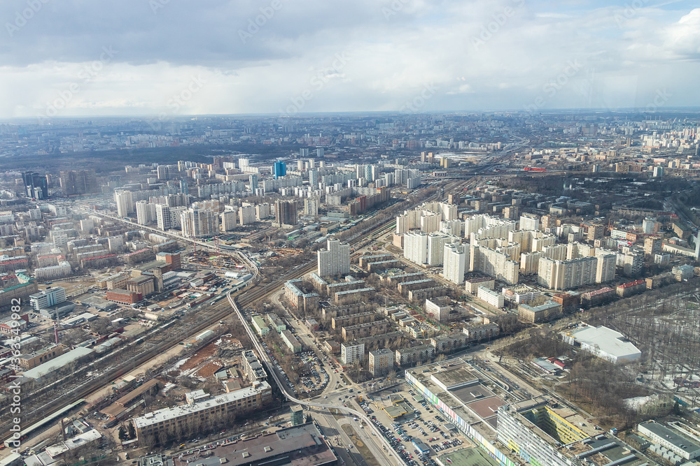 Russia, Moscow, 2019: view from the Ostankino TV tower to the city panorama, view towards the Ostankino television center and the Dmitrovskaya metro station