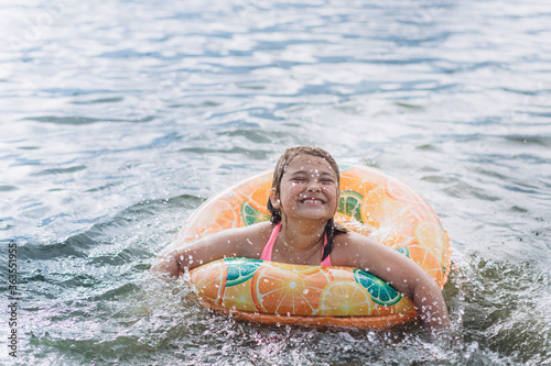 Young girl portrait on sea. Swimming children activity  © Andreshkova Nastya