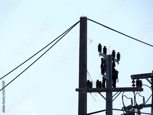 Man Working on the Working at height on construction site with blue sky © dear2627