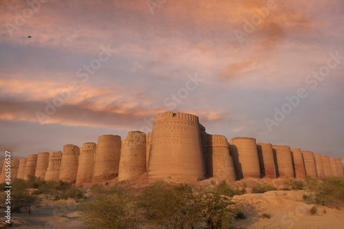 old fort in desert with dramtic sky and clouds, Derawar fort in desert cholistan  photo