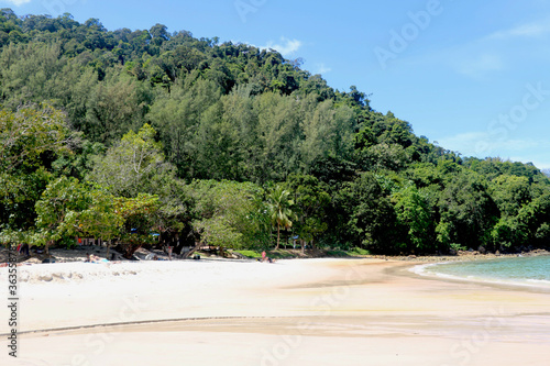 Coast of beach and small hill with green trees and blue sky view at langkawi-Malaysia © ARPIT