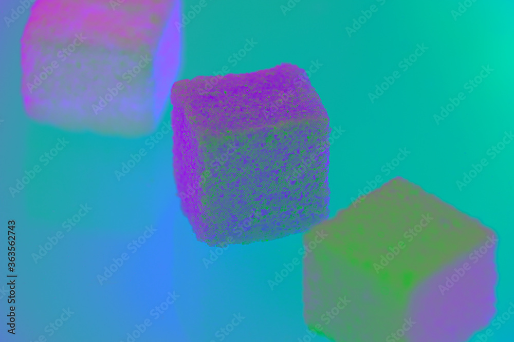 Strange colorful sugar cubes on the background Strange colorful sugar cubes on the background