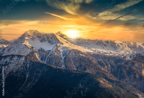 Fototapeta Scenic View Of Snowcapped Mountains Against Sky During Sunset