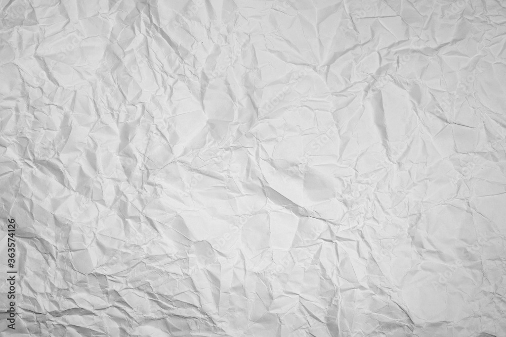 surface of the crumpled paper is gray.