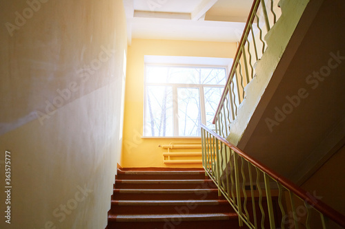 Close-up of the internal staircase in the old school. Empty stairs © svetlanaz