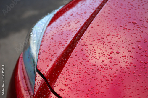 Detail of a wet red car photo