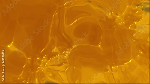 yellow liquid moving glassy  background