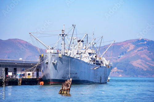 old world war II ship docked near san franciscp photo