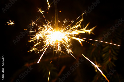 Bengali fire. Festive firework salute burst. Festive new year background.