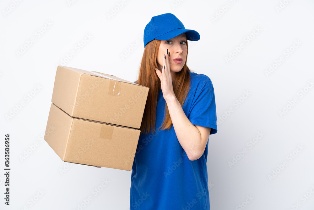 Young delivery woman over isolated white background whispering something Young delivery woman over isolated white background whispering something