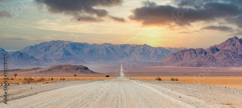 Canvas-taulu Gravel road and beautiful landscape in Namibia