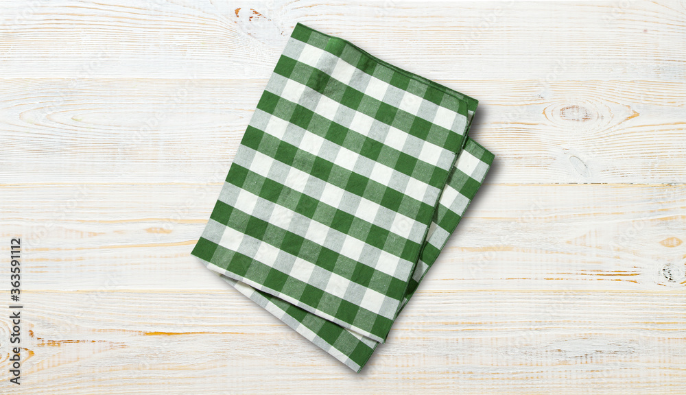 Napkin. Stack of colorful dish towels on white desk Napkin. Stack of colorful dish towels on white desk