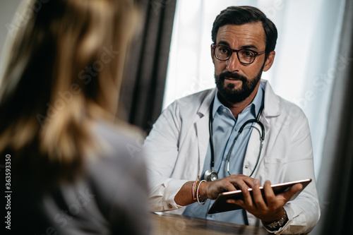 portrait of a doctor during a patient consultation