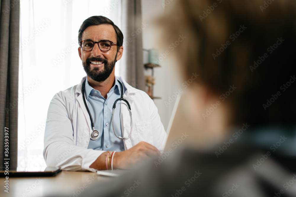 a doctor consults a patient a doctor consults a patient