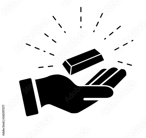gold bar in hand icon vector with glow
