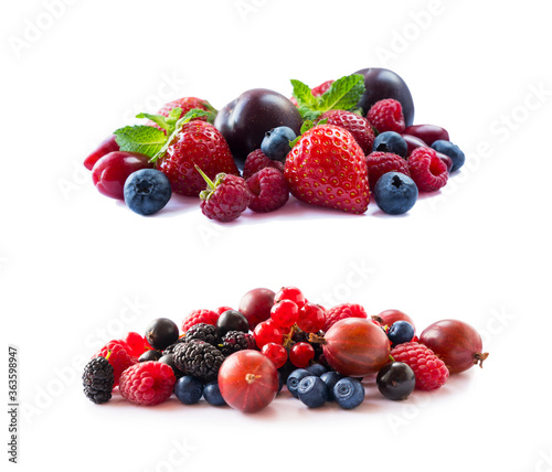 Fruits, berries isolated on white background. Currant, blueberry, strawberry, plum, gooseberry, mulberry, raspberry. Mixed berries isolated on white background.Berries close-up