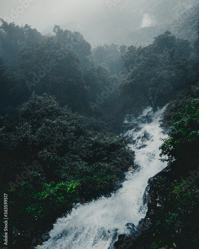 fog in the mountains and waterfall