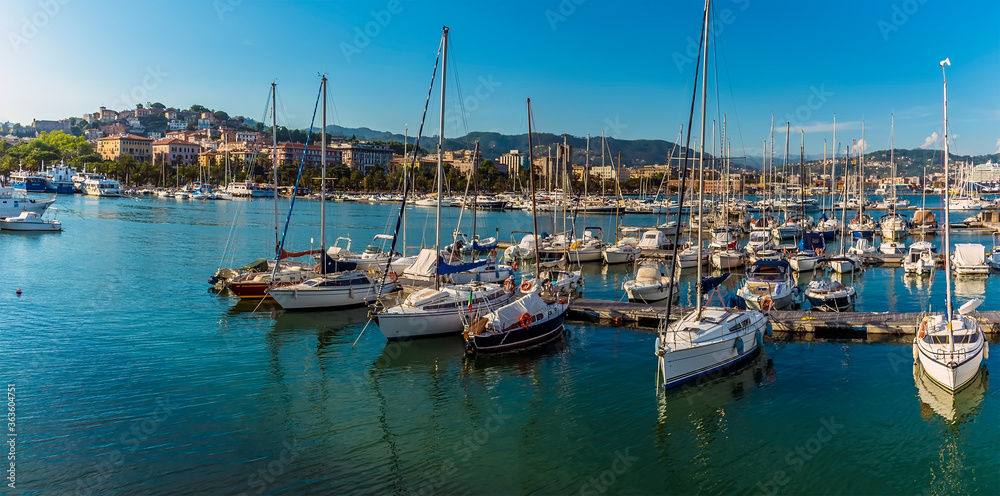 A view of yachts in the harbour and the shore in La Spezia, Italy in summer