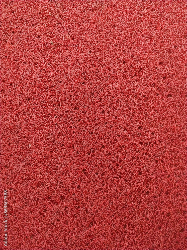 Fototapeta premium Close up red carpet background texture