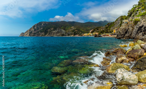 A panorama view the rocky shore line at Monterosso al Mare, Italy in summer