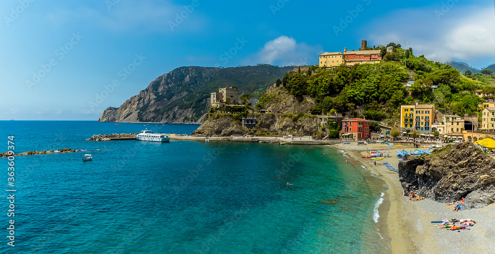 A panorama view across the beach towards the headland at Monterosso al Mare, Italy in summer