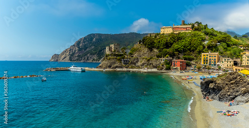 A panorama view across the beach towards the headland at Monterosso al Mare, Italy in summer