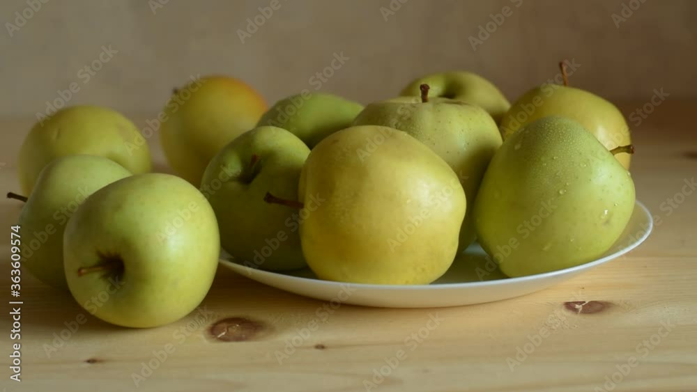Yellow apples on the table. harvest, healthy food Yellow apples on the table. harvest, healthy food