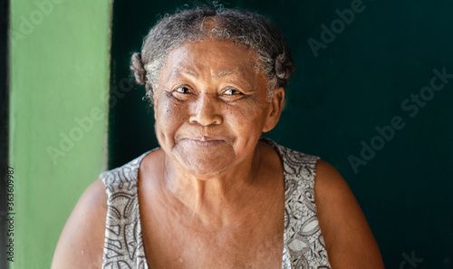 mator lady looking homeless indigenous, smoked with sad face and blue eyes photo