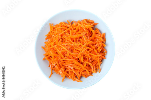 Plate with tasty carrot salad isolated on white background