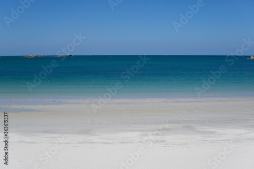 white sand beach and blue turquoise sea