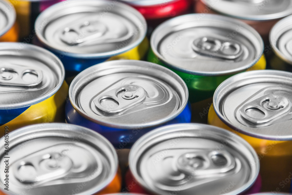 aluminum cans with carbonated water, energy drinks or beer. Background of aluminum cans aluminum cans with carbonated water, energy drinks or beer. Background of aluminum cans
